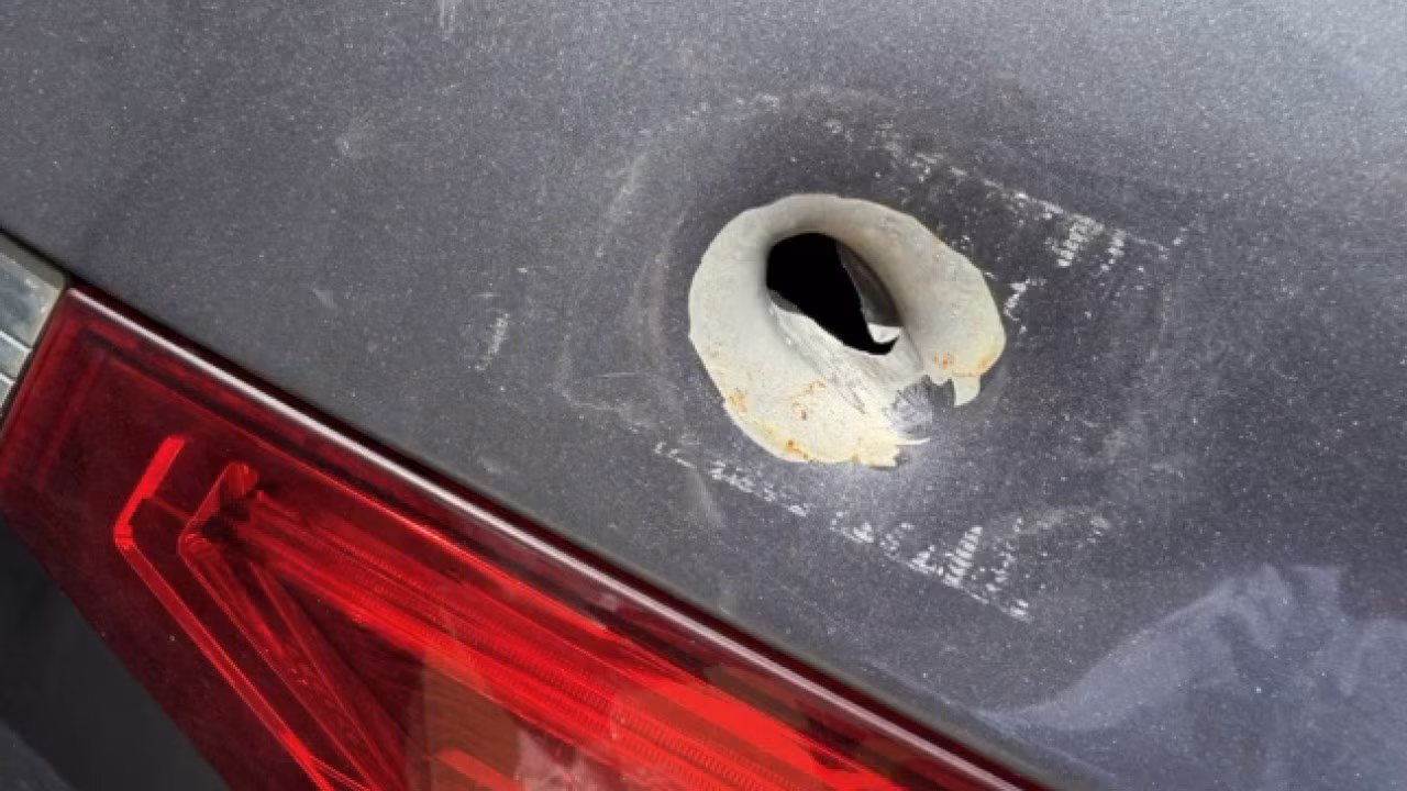 Minivan struck by gunfire near busy Newnan shopping center