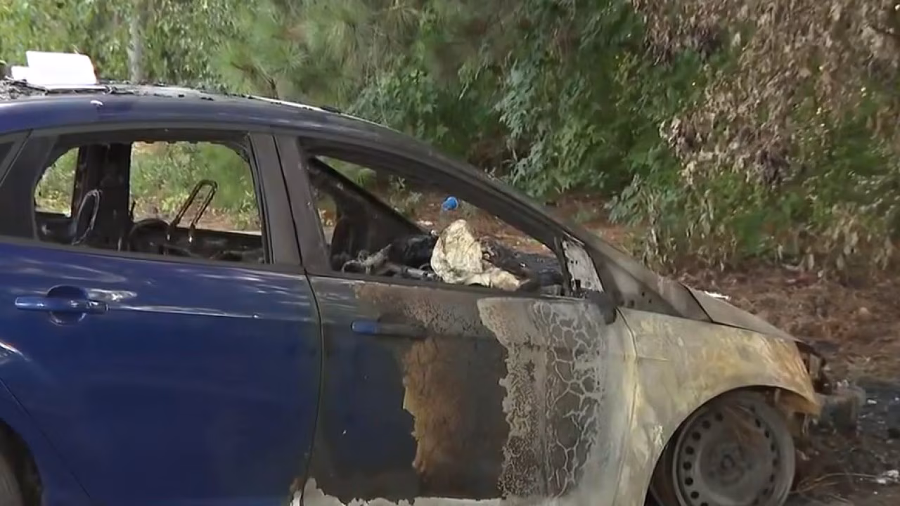 Man and woman wanted for lighting car fire at Riverdale plaza